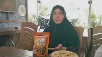 Lewat Pendampingan PNM, Ibu Murni Kembangkan Usaha Kue dari Modal Kecil